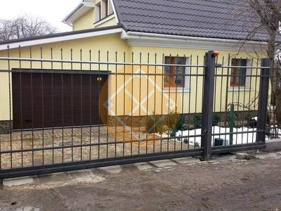 Решетчатые откатные ворота с ковкой