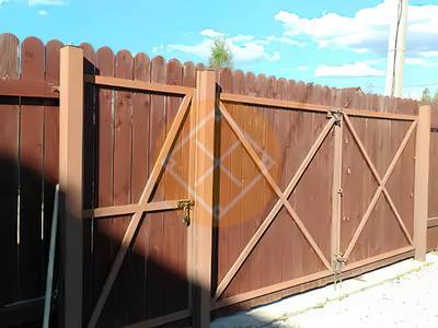 Металлические распашные ворота из штакетника с калиткой